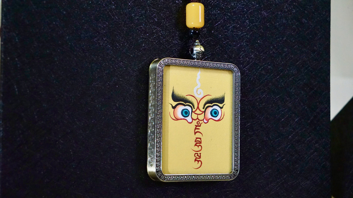 Yellow Jambhala Wisdom Eyes Thangka Pendant | Hand-Painted Guardian of Prosperity & Spiritual Insight