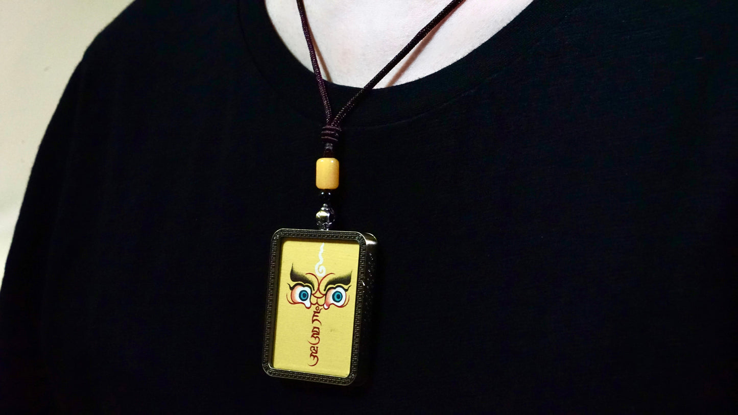 Yellow Jambhala Wisdom Eyes Thangka Pendant | Hand-Painted Guardian of Prosperity & Spiritual Insight